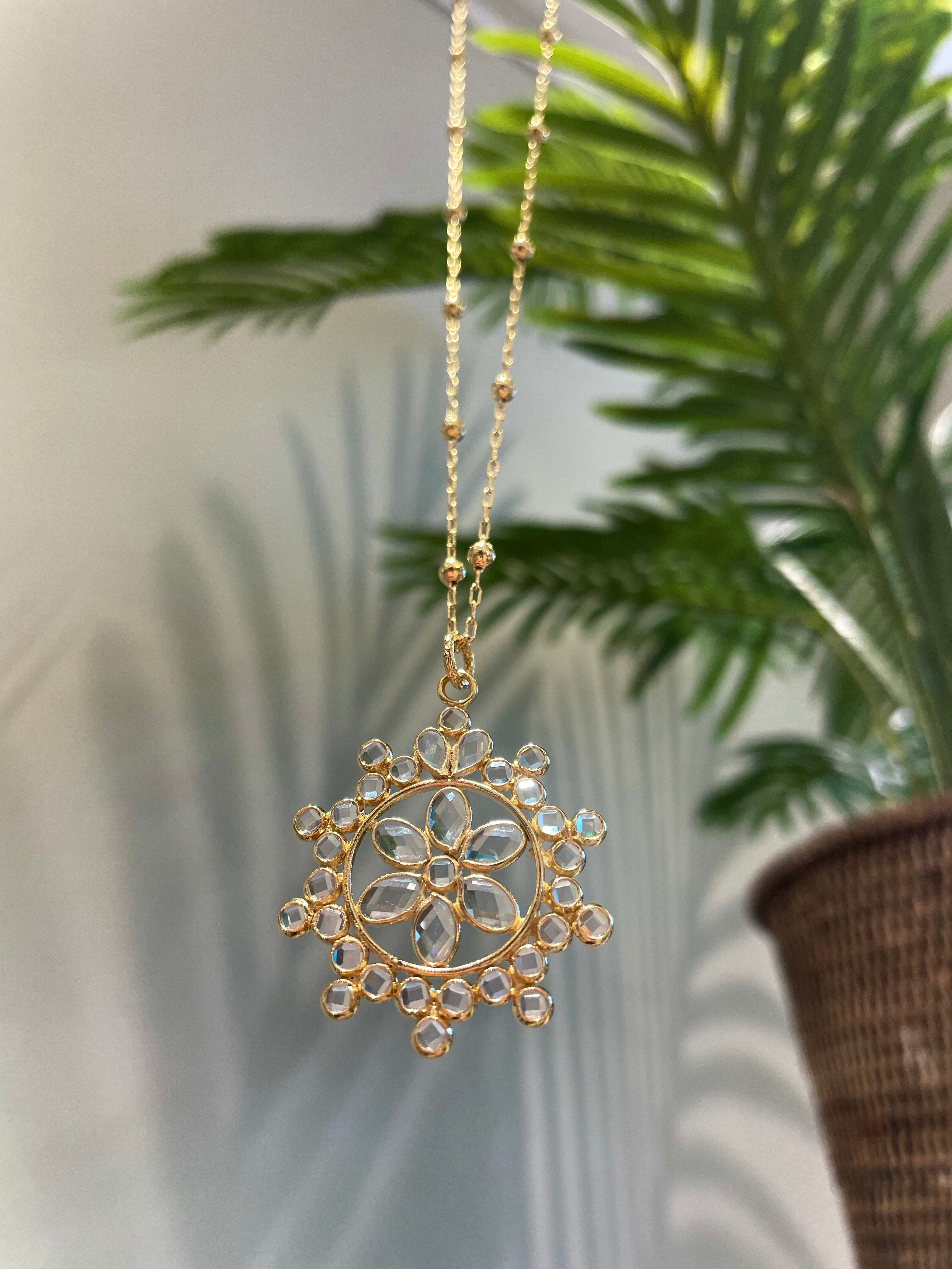 star gold pendant earrings by virginie berman