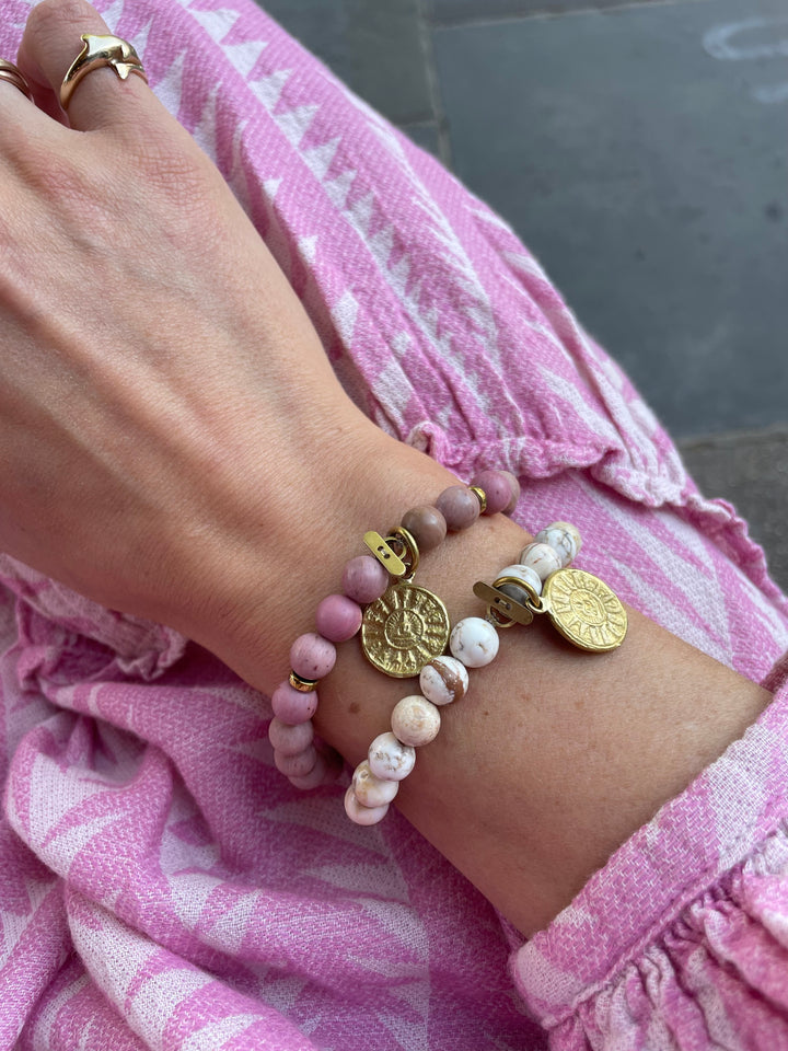 beaded bracelets pink stones white stones with sun medallion in gold