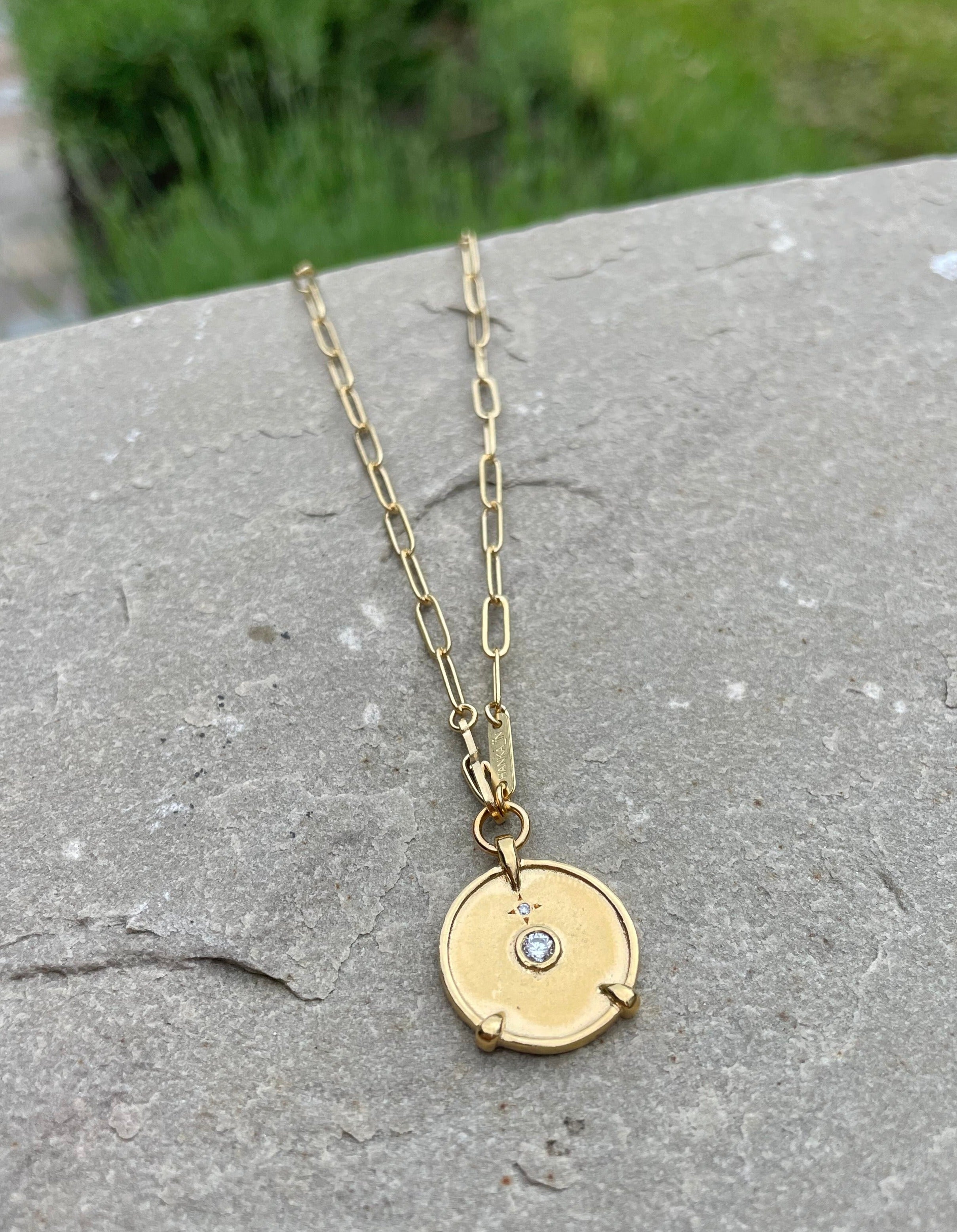 long gold necklace with brushed gold pendant hanka in falcon necklace ego medallion