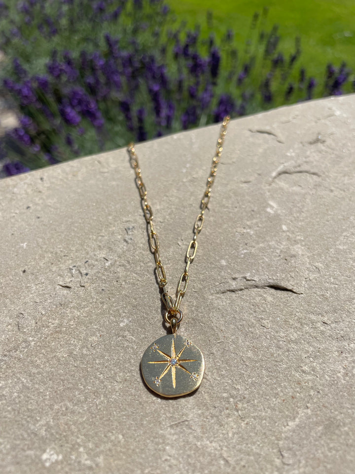 gold link chain necklace with sun medallion the falcon necklace neo medallion hanka in