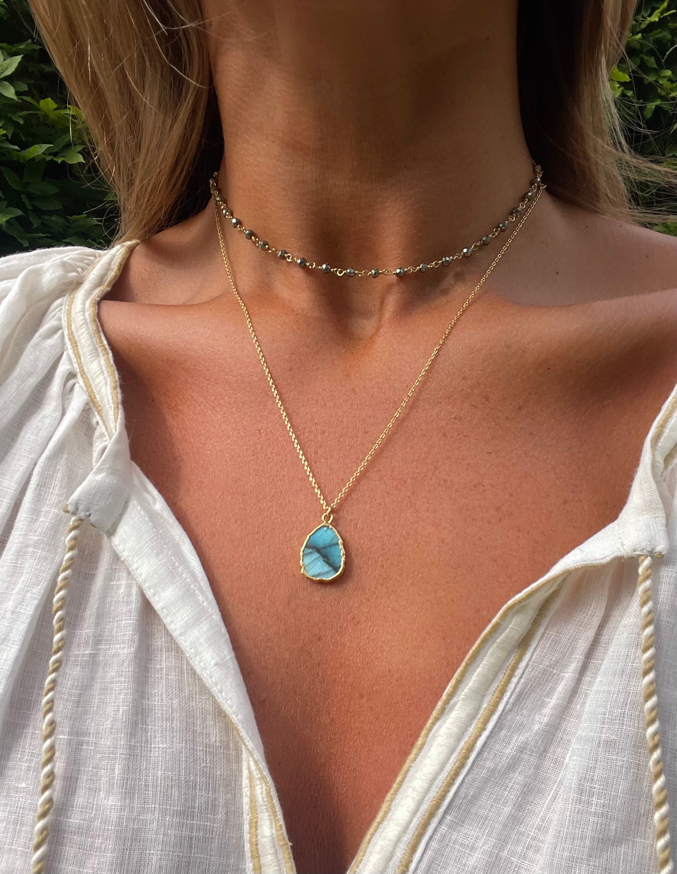 the gemma necklace by hanka in with labradorite and pyrite stones and 24k gold pated wrap around necklace or long necklace
