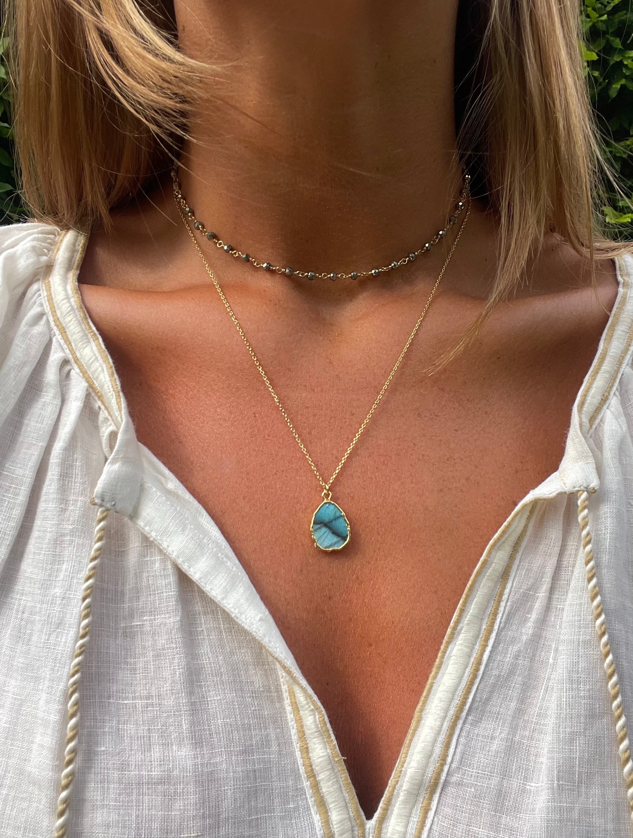 the gemma necklace by hanka in with labradorite and pyrite stones and 24k gold pated wrap around necklace or long necklace