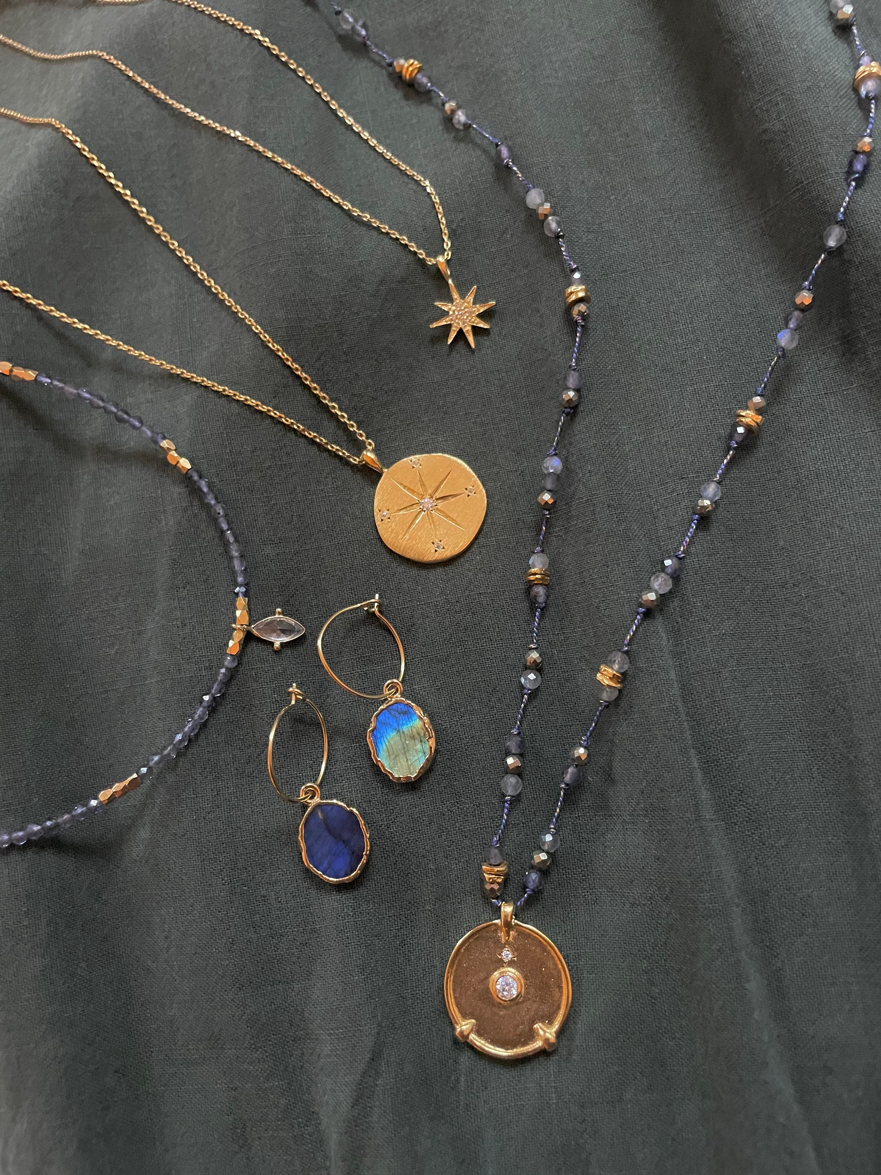 navy blue & gold plated jewellery made from iolite stones by hanka in