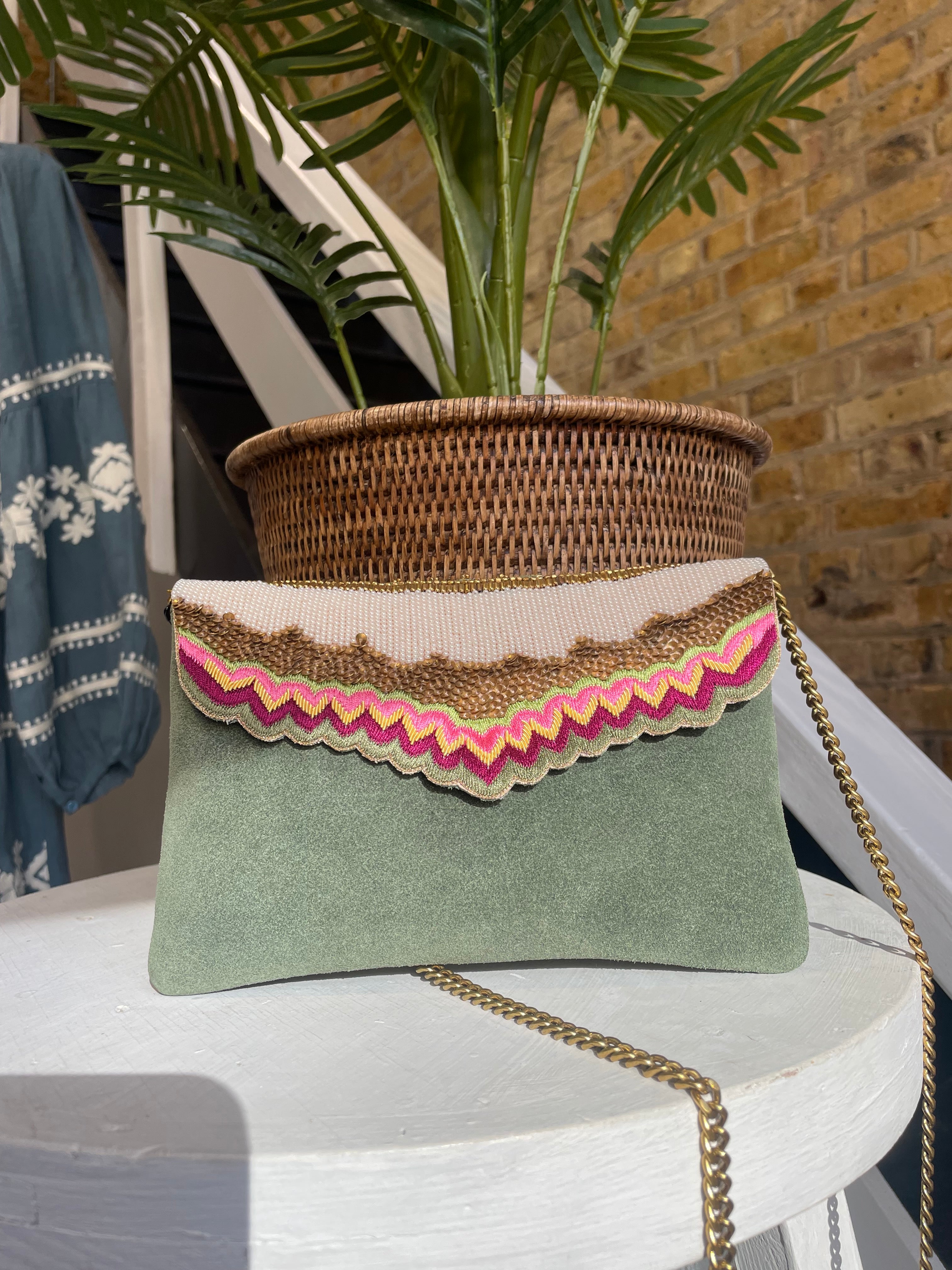 embroidered clutch or cross body bag green and pink