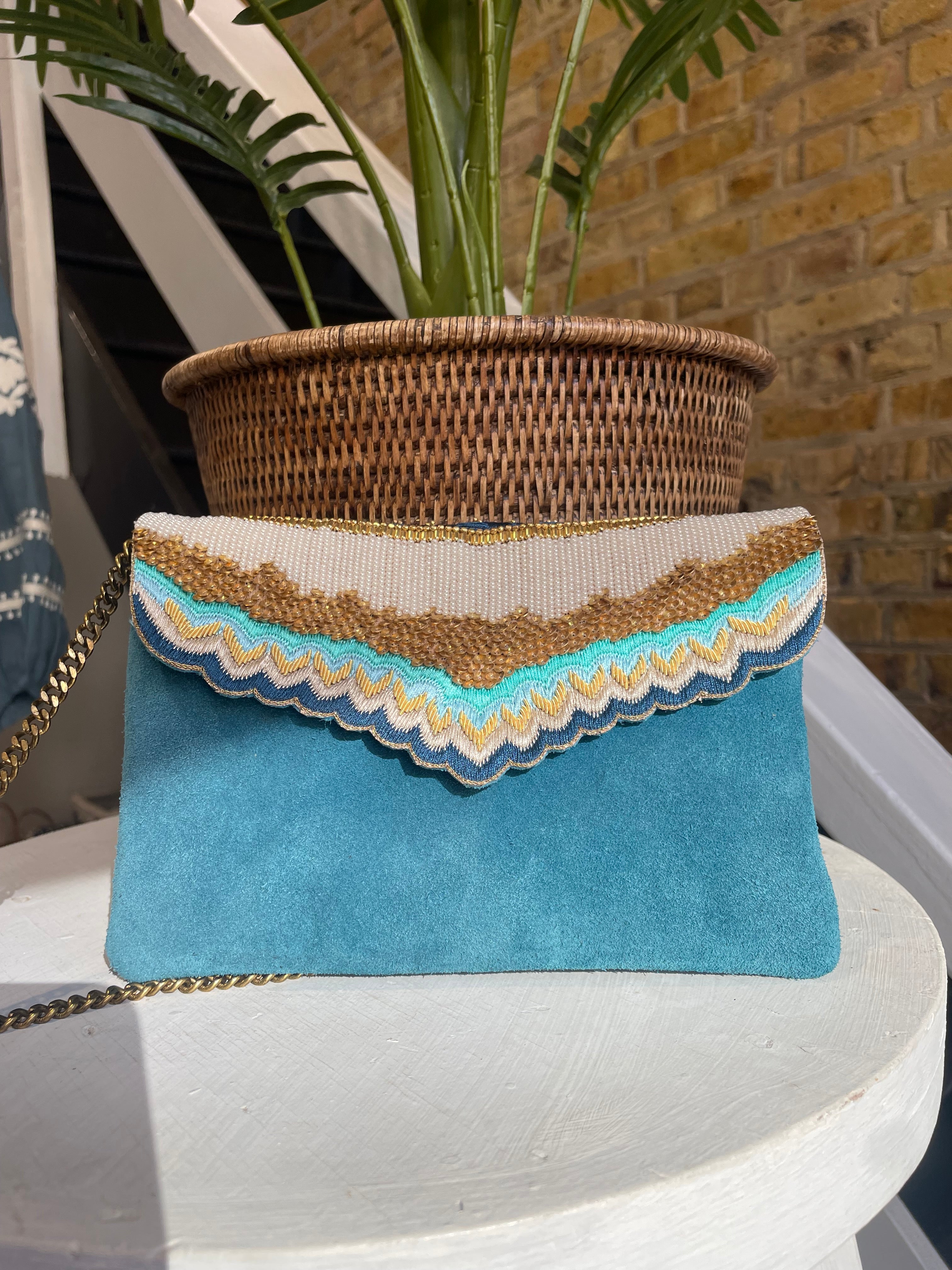 embroidered clutch bag in turquoise nahua official