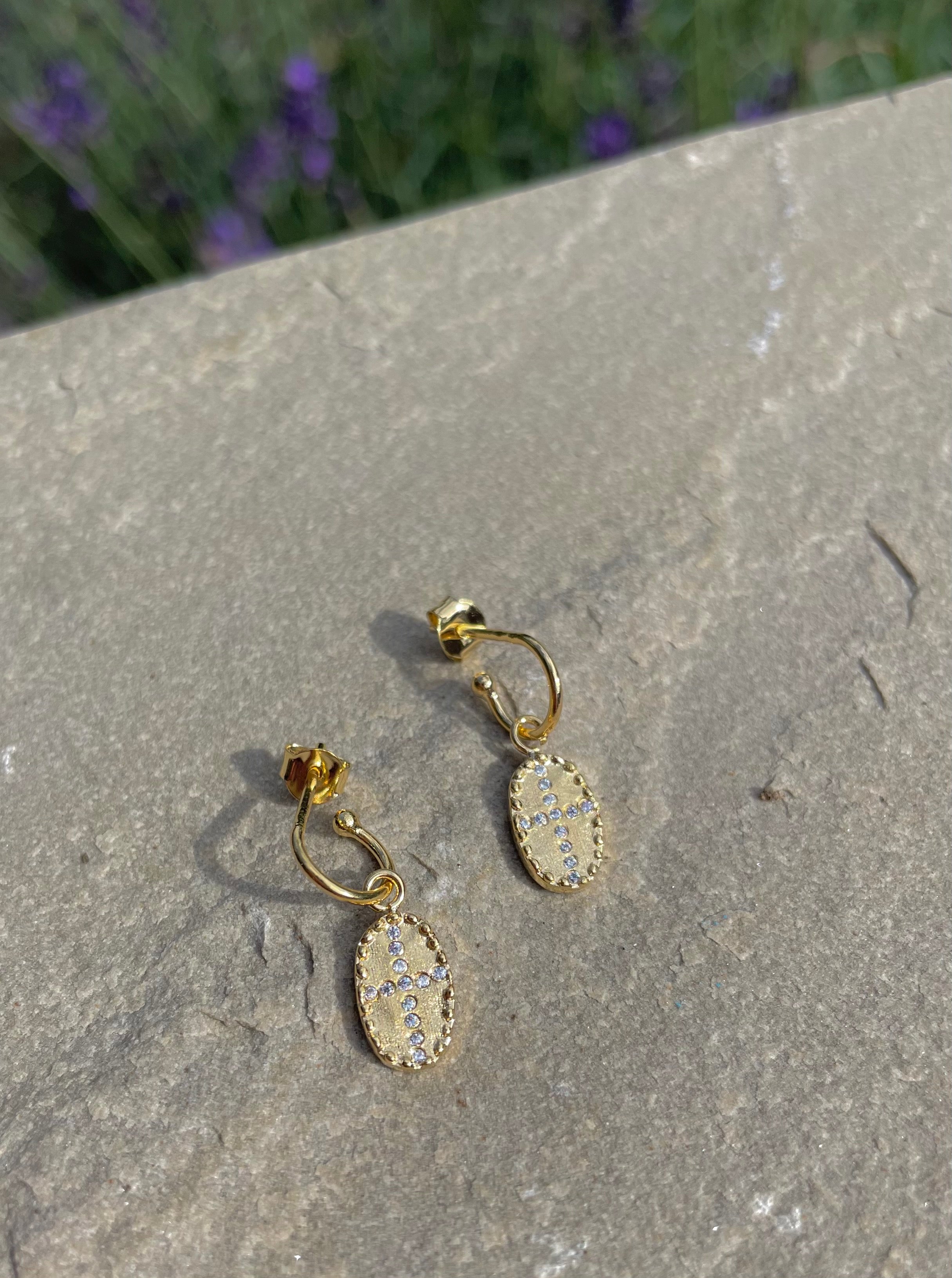 huggie earrings with white stones by louise hendricks