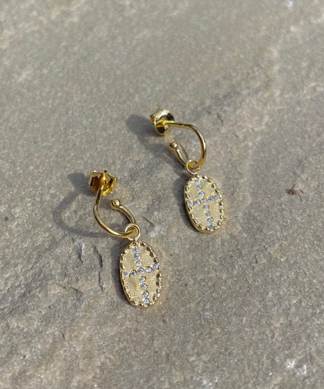 huggie earrings with white stones by louise hendricks
