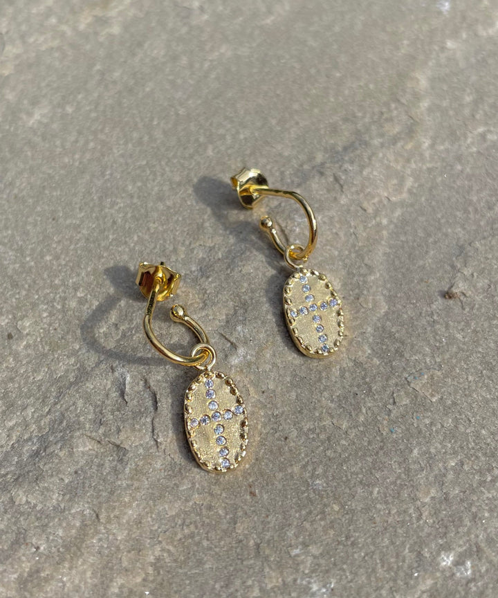 huggie earrings with white stones by louise hendricks
