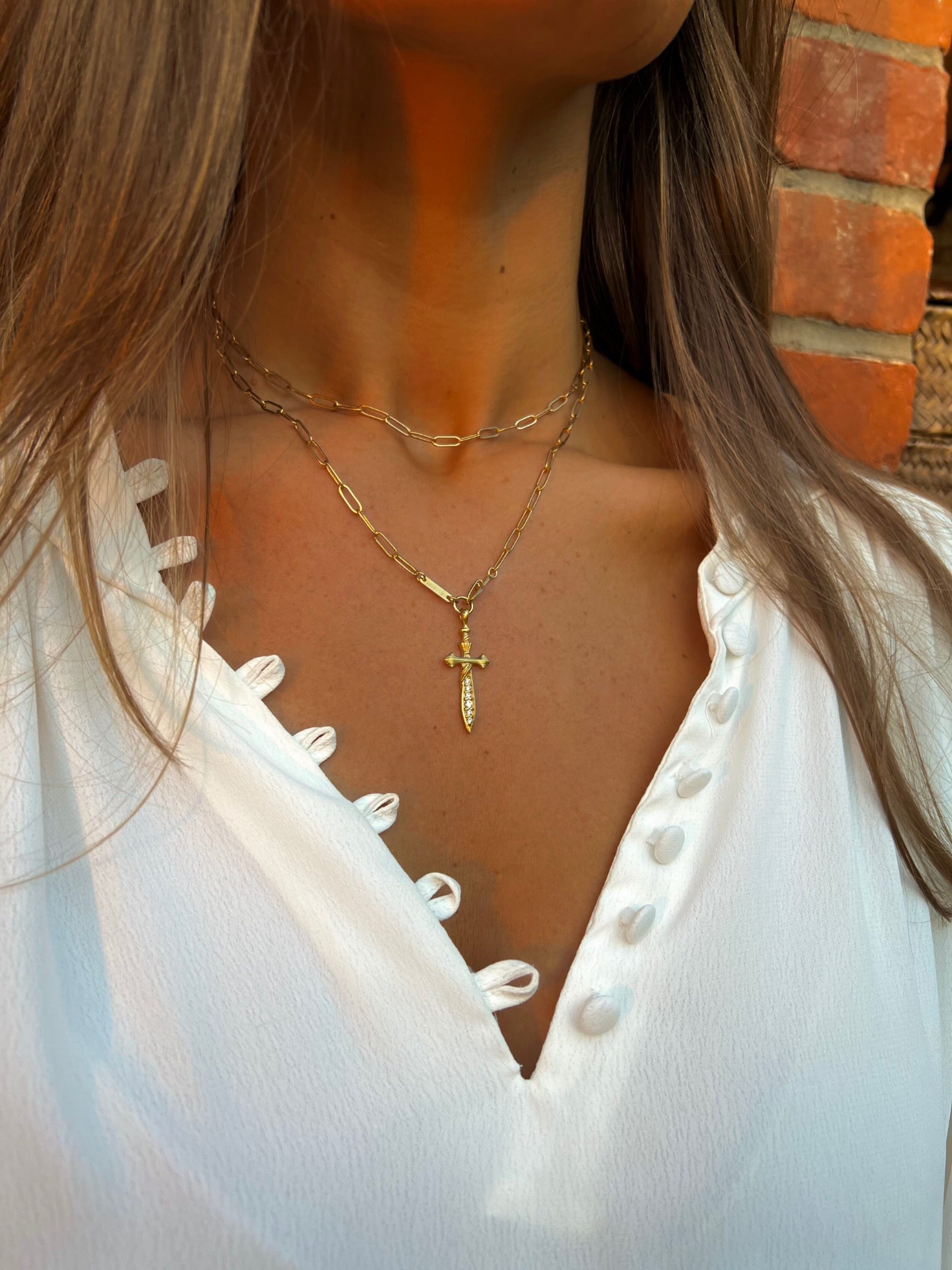 gold plated wrap around necklace with link chain and sword pendant hanka in layering necklace
