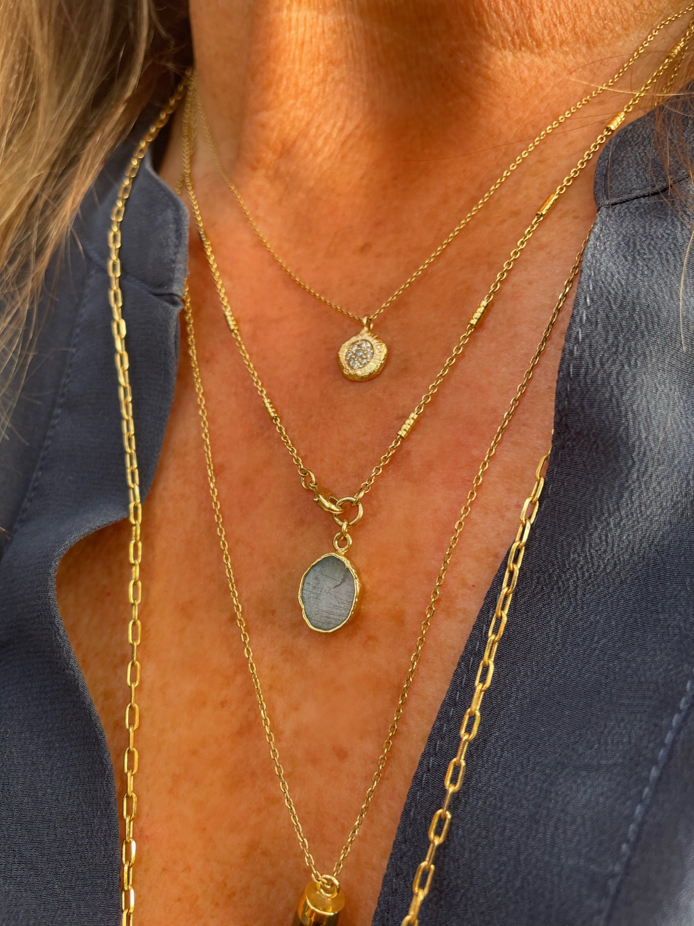 layering gold plated necklaces with semi precious stones